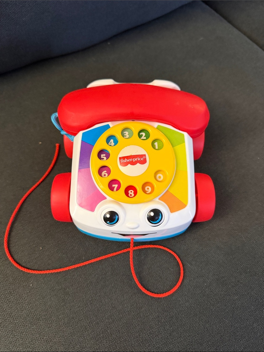 Fisher price rotary phone with pull cord 2015 made in Mexico